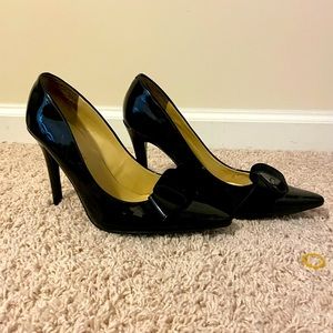Hardly worn Patent Leather Pumps!!  Very flattering!!